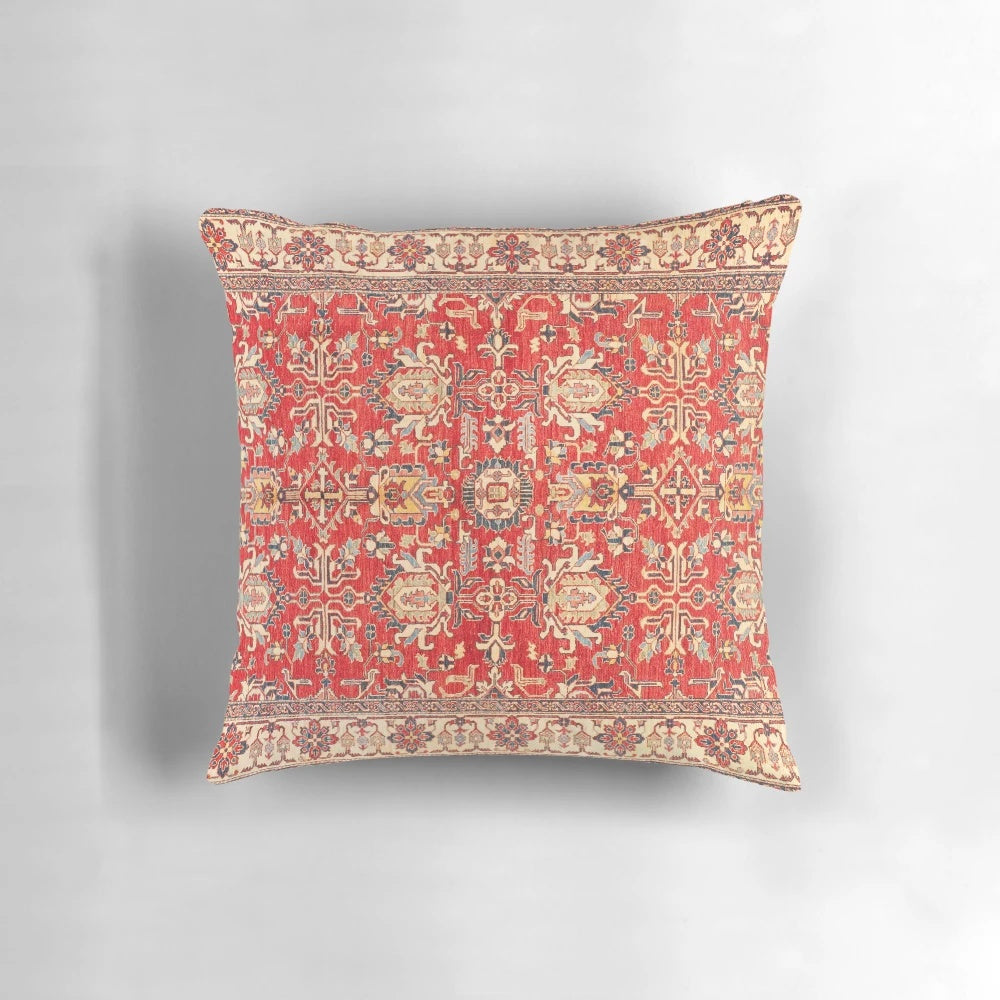 Closeup of a vibrant, vintage-inspired Turkish textile pillow with a traditional woven pattern