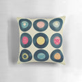 Colorful patterned pillow featuring retro vinyl records and a vintage-inspired design