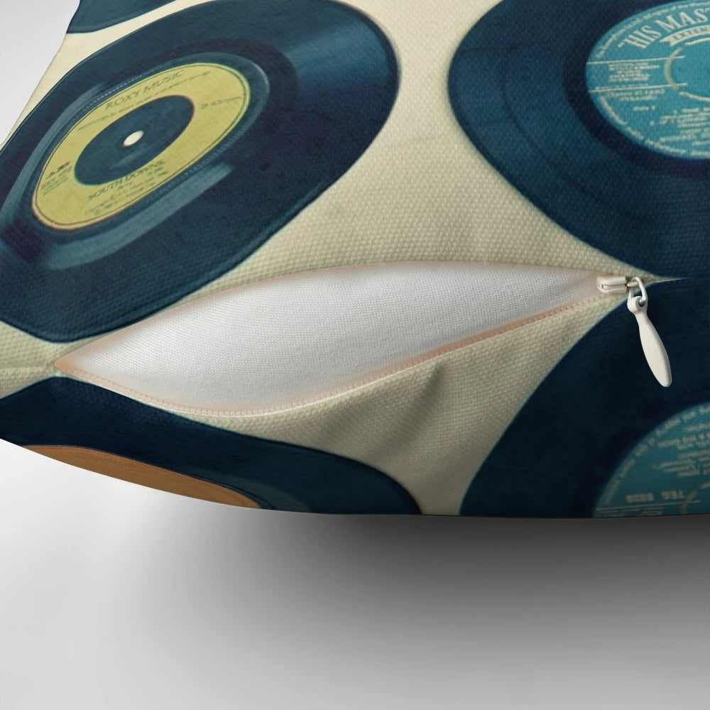 Colorful patterned pillow featuring retro vinyl records and a vintage-inspired design