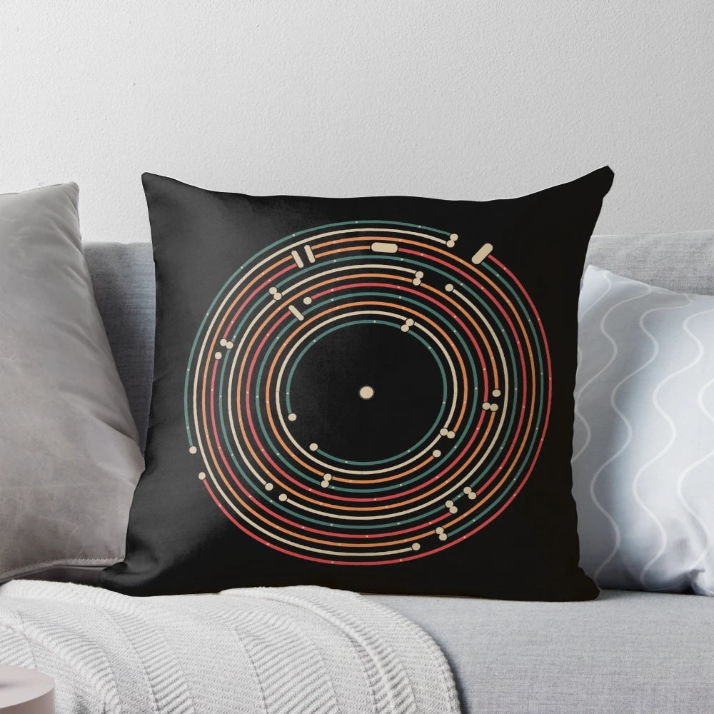 Colorful pillow featuring a vinyl record-inspired metro map labyrinth design