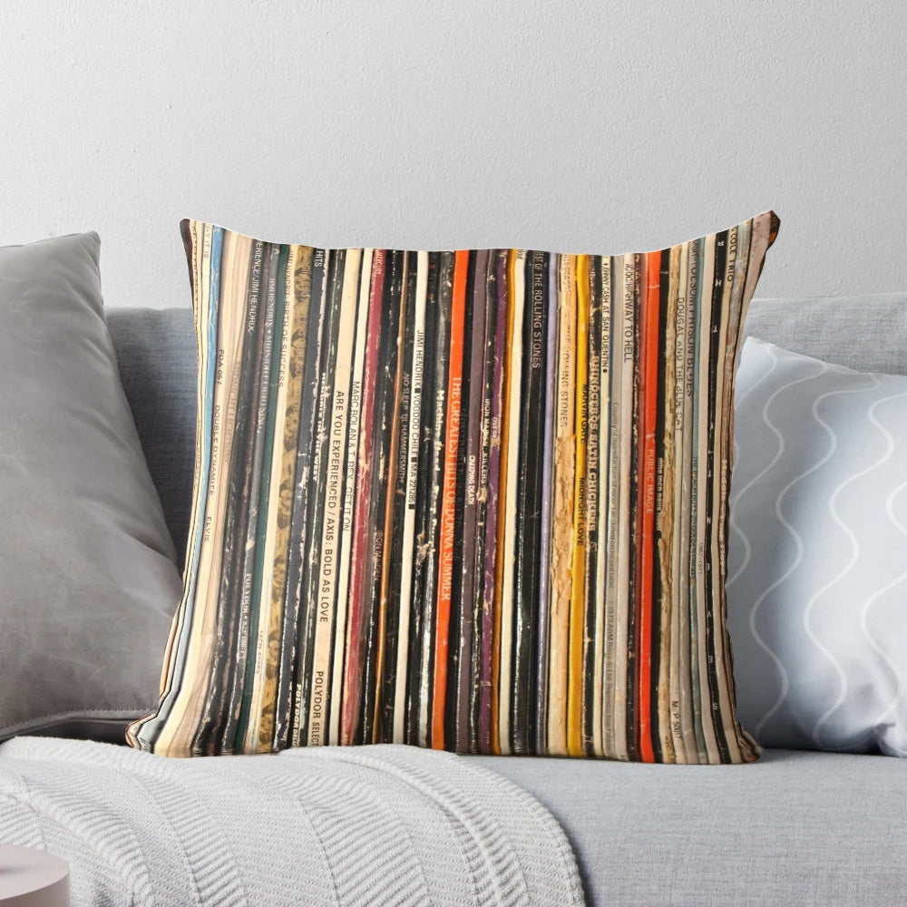 Decorative throw pillow featuring a vibrant, abstract photograph of a vinyl record collection