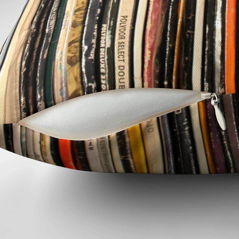 Decorative throw pillow featuring a vibrant, abstract photograph of a vinyl record collection