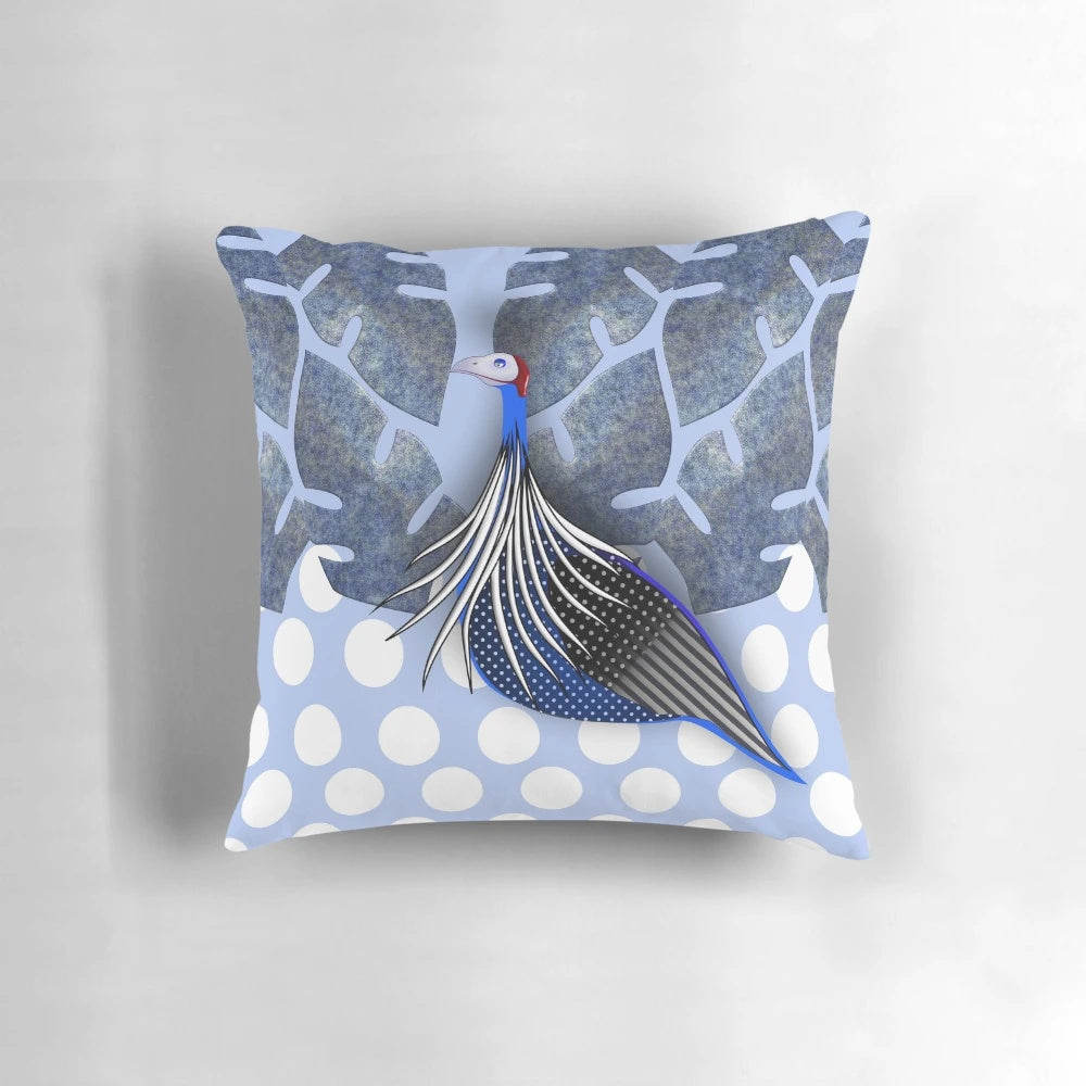 A decorative throw pillow featuring an abstract, nature-inspired pattern of a vulturine guinea fowl in shades of blue, grey, black, and white.