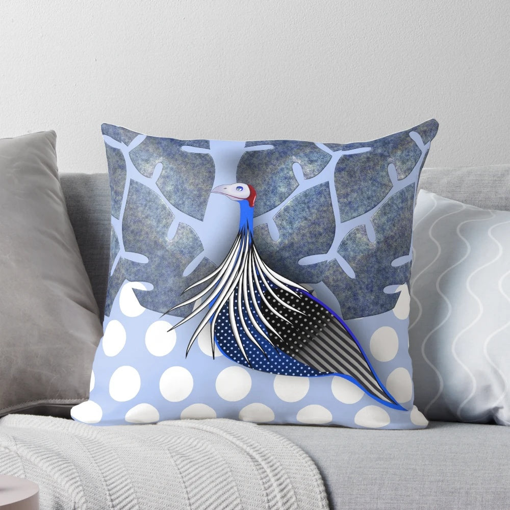 A decorative throw pillow featuring an abstract, nature-inspired pattern of a vulturine guinea fowl in shades of blue, grey, black, and white.