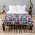 Colorful plush blanket featuring a Warhol-inspired dog design