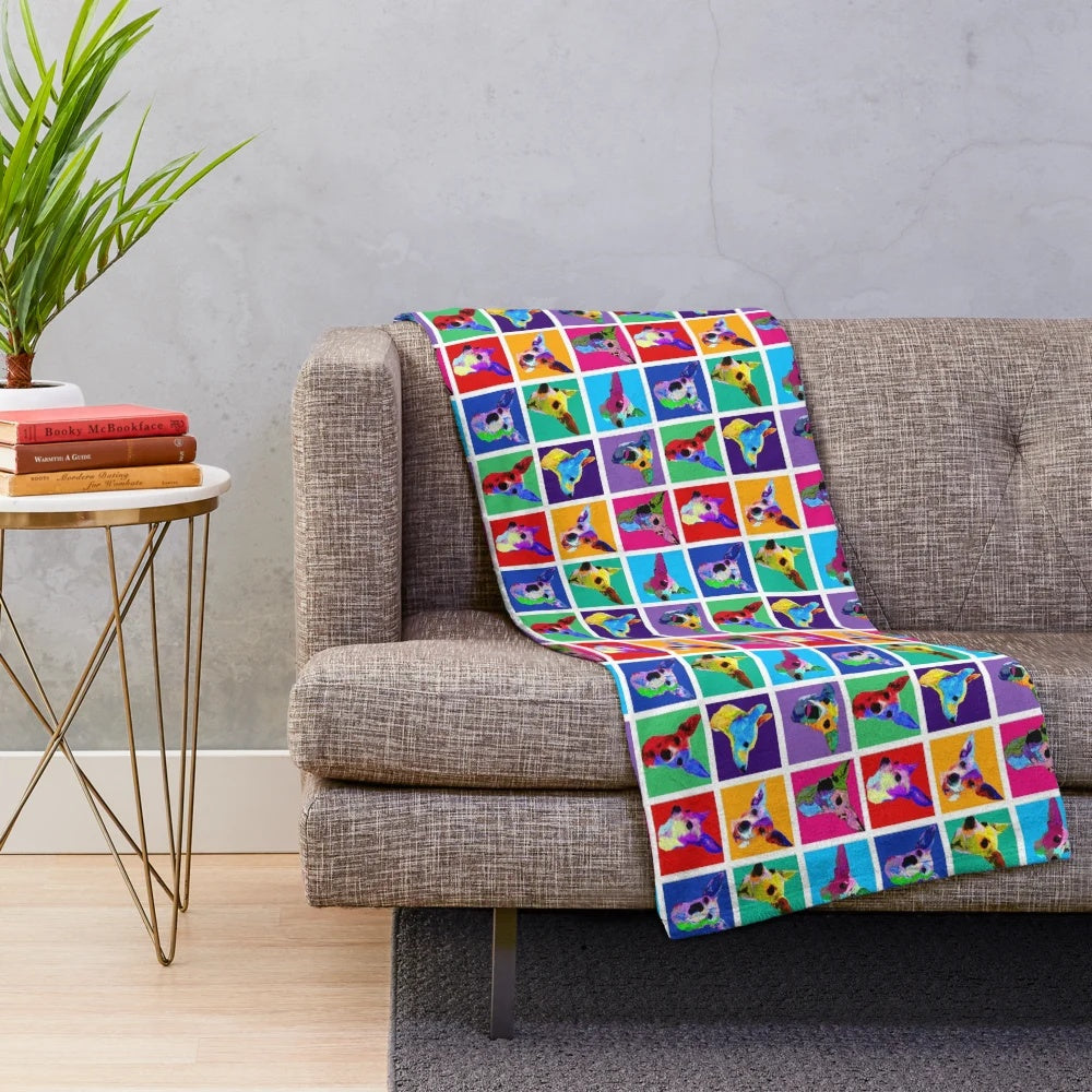 Colorful plush blanket featuring a Warhol-inspired dog design