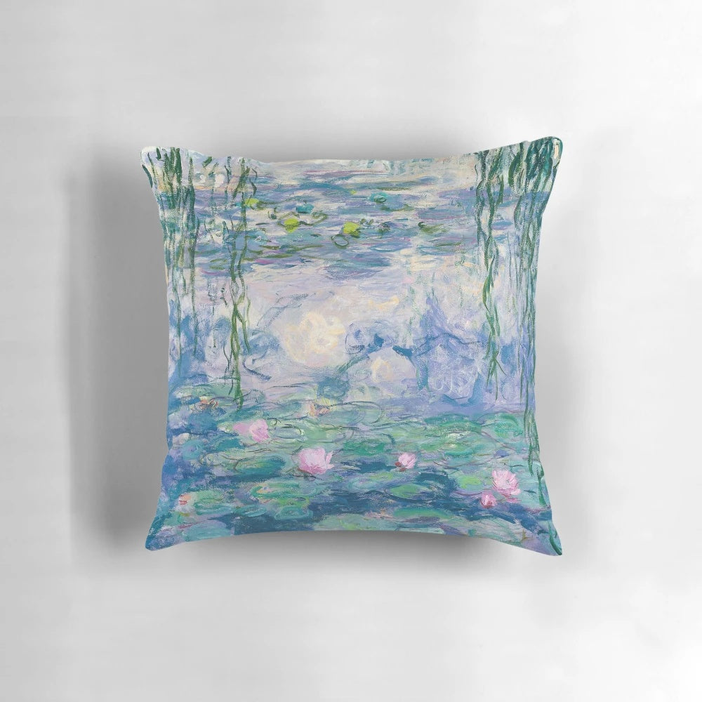 A decorative throw pillow featuring a beautiful water lily painting in the style of impressionist artist Claude Monet.