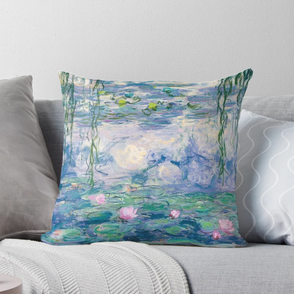 A decorative throw pillow featuring a beautiful water lily painting in the style of impressionist artist Claude Monet.