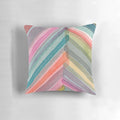 A colorful, bold, and modern watercolor abstract geometric chevron pattern pillow.