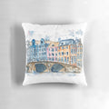 Colorful watercolor painting of traditional Amsterdam houses, bridges, and canals, printed on a plush pillow.