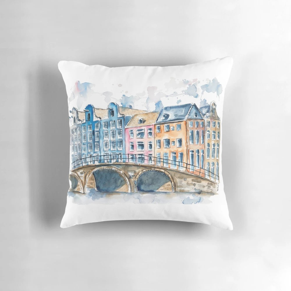 Colorful watercolor painting of traditional Amsterdam houses, bridges, and canals, printed on a plush pillow.