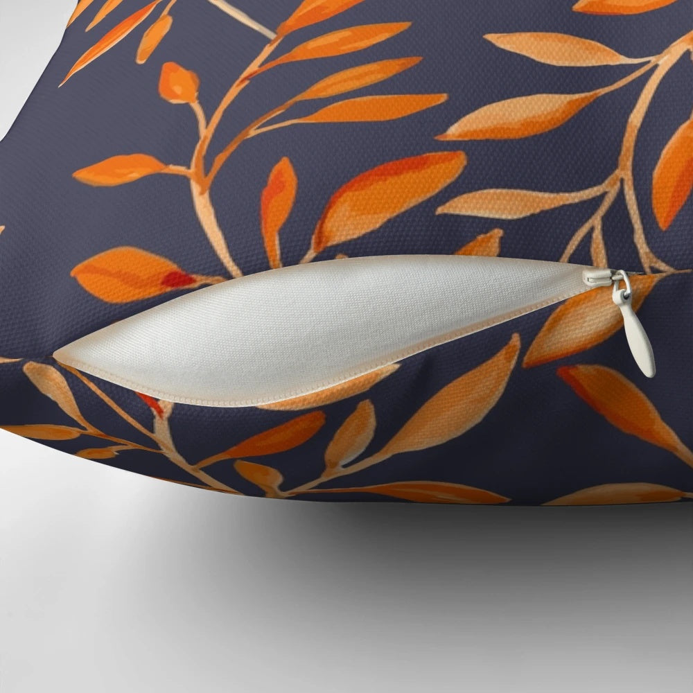 Decorative pillow featuring a vibrant watercolor pattern of autumn leaves