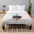 Colorful watercolor guitar design on a plush blanket