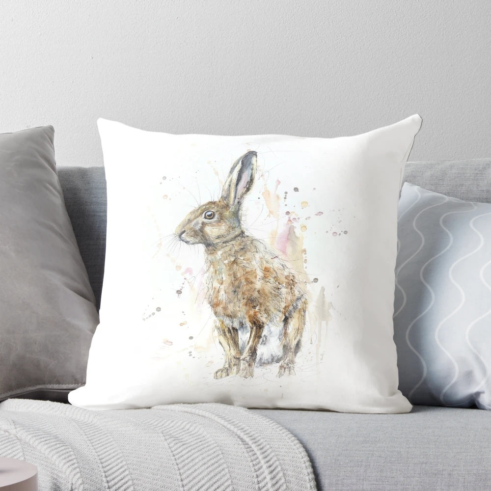 Colorful watercolor painting of a hare on a decorative throw pillow