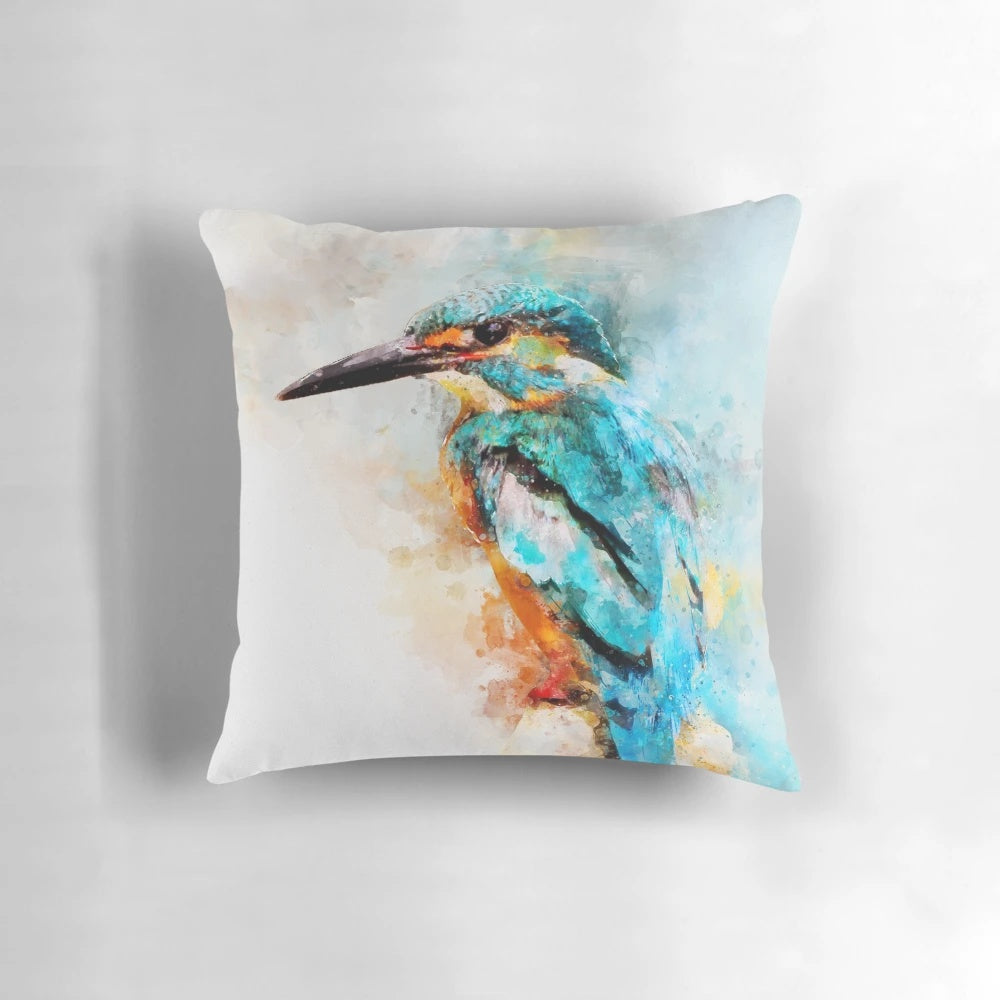 Colorful watercolor painting of a kingfisher bird on a decorative pillow