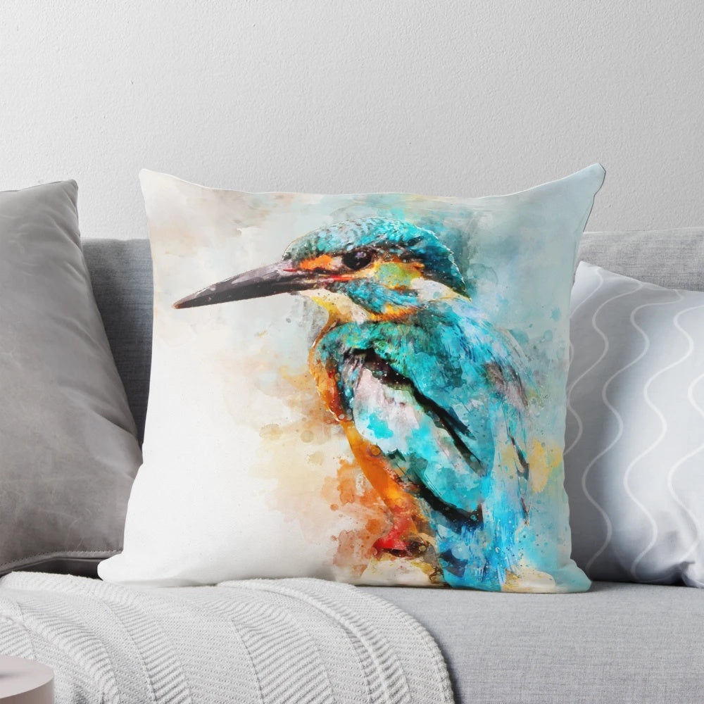 Colorful watercolor painting of a kingfisher bird on a decorative pillow