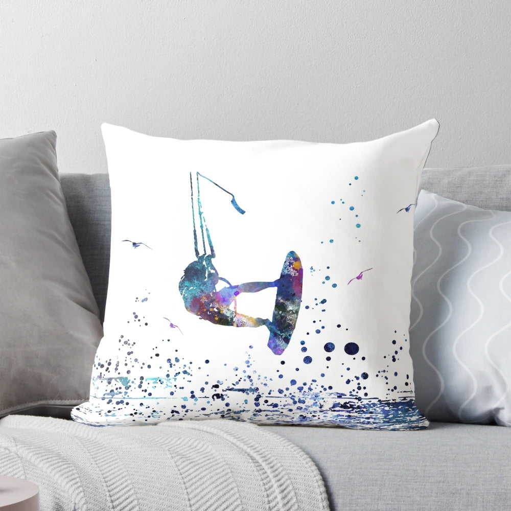 Colorful watercolor painting of a kitesurfer riding the waves, printed on a soft, square pillow.
