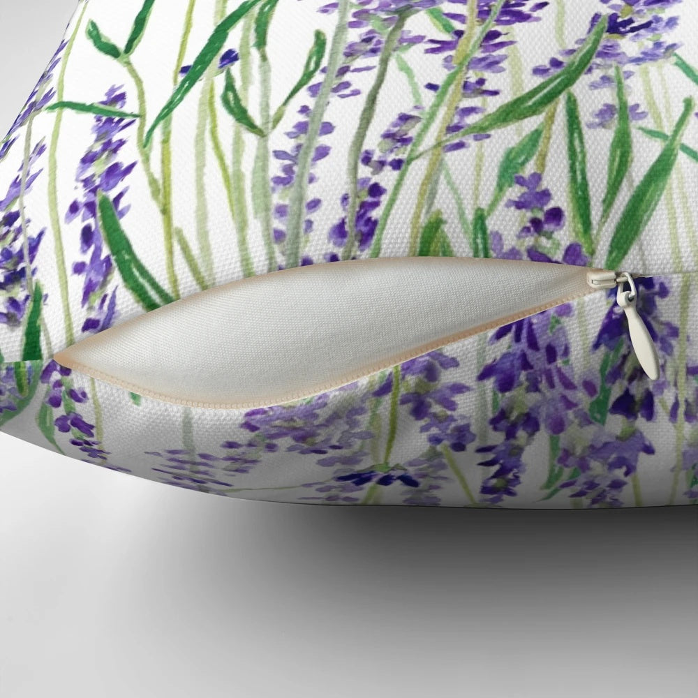 A beautiful watercolor painting of purple lavender flowers, featured on a soft, high-quality throw pillow.