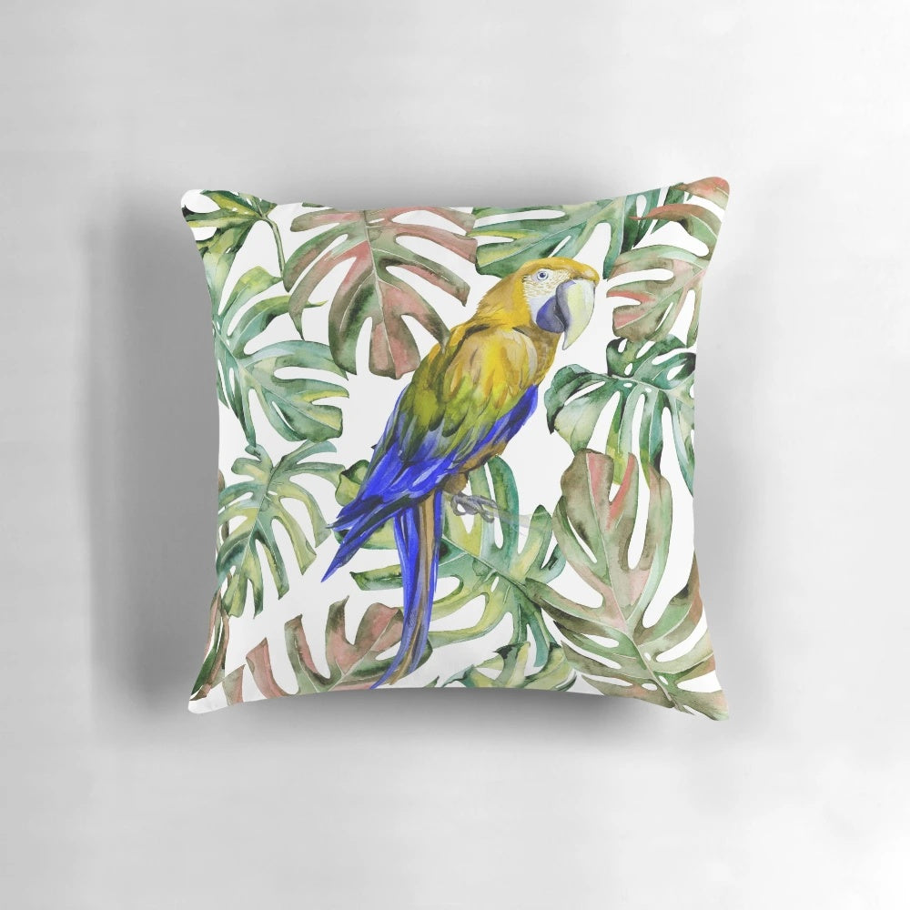 Vibrant watercolor painting of a parrot perched in a lush jungle landscape on a decorative throw pillow