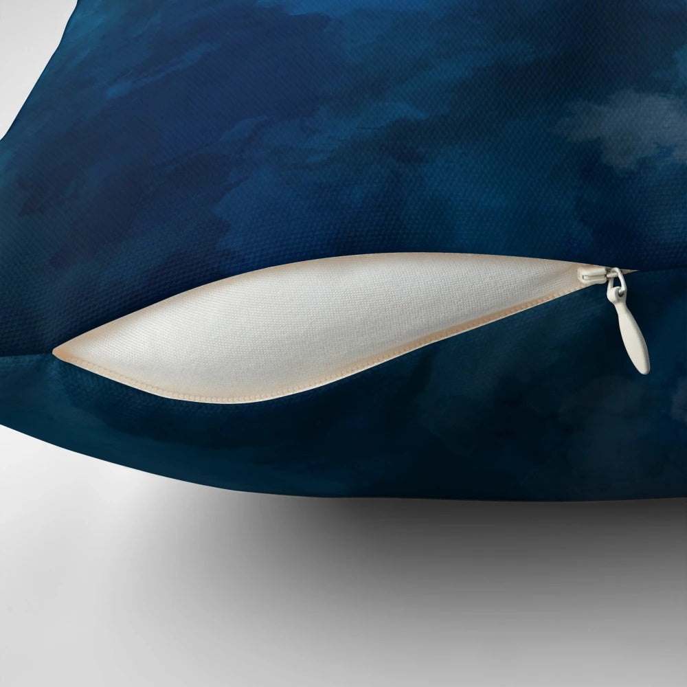 A blue and white abstract watercolor pattern decorative throw pillow.