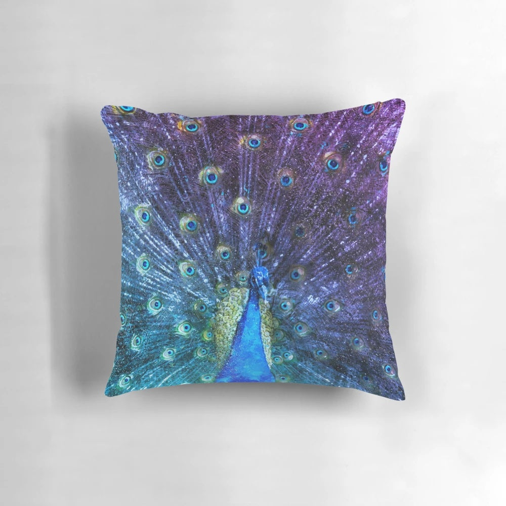 Colorful watercolor painting of a majestic peacock in shades of purple on a decorative throw pillow