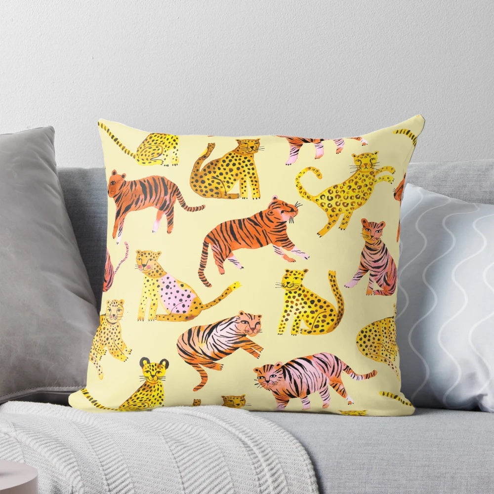 Decorative throw pillow featuring a vibrant watercolor painting of tigers and leopards in the African savannah