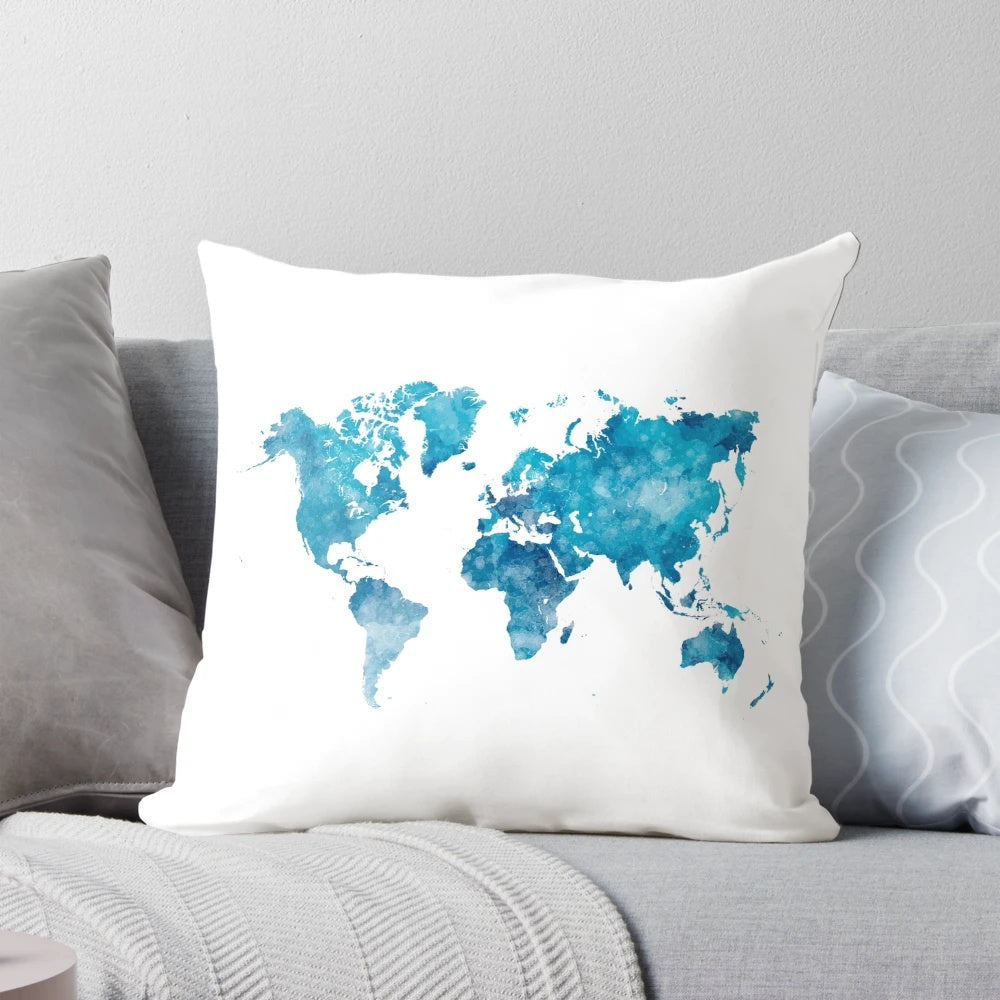 Vibrant watercolor world map design printed on a plush throw pillow