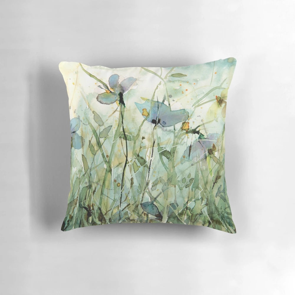 Colorful wild floral throw pillow featuring a watercolor nature design