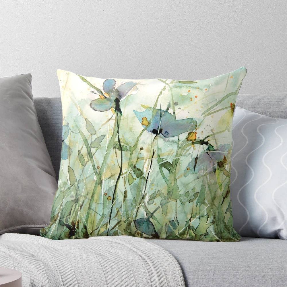 Colorful wild floral throw pillow featuring a watercolor nature design