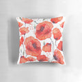 Closeup of vibrant wild red poppies in a field, featured on a decorative throw pillow