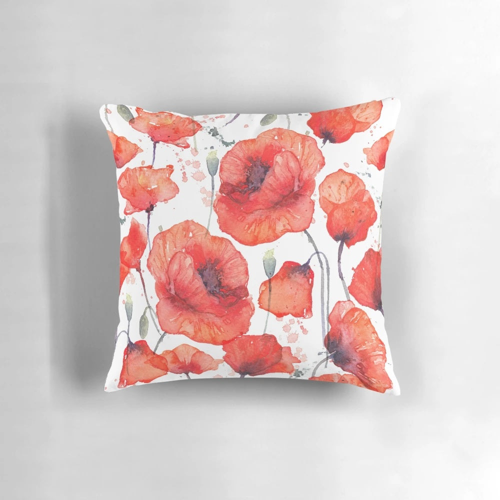 Closeup of vibrant wild red poppies in a field, featured on a decorative throw pillow