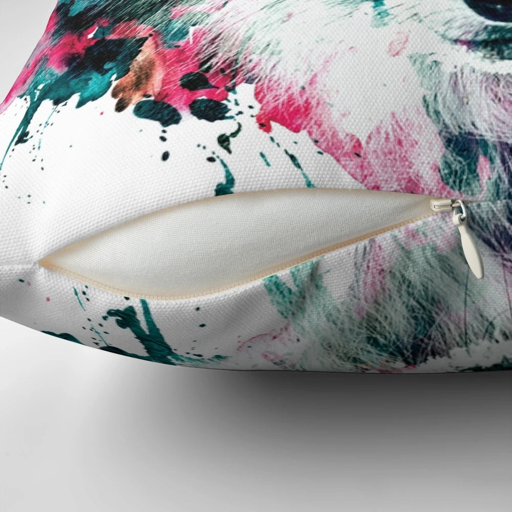 A colorful and abstract wolf face printed on a decorative throw pillow.