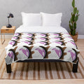 Woodpecker plush blanket featuring a vibrant, abstract design