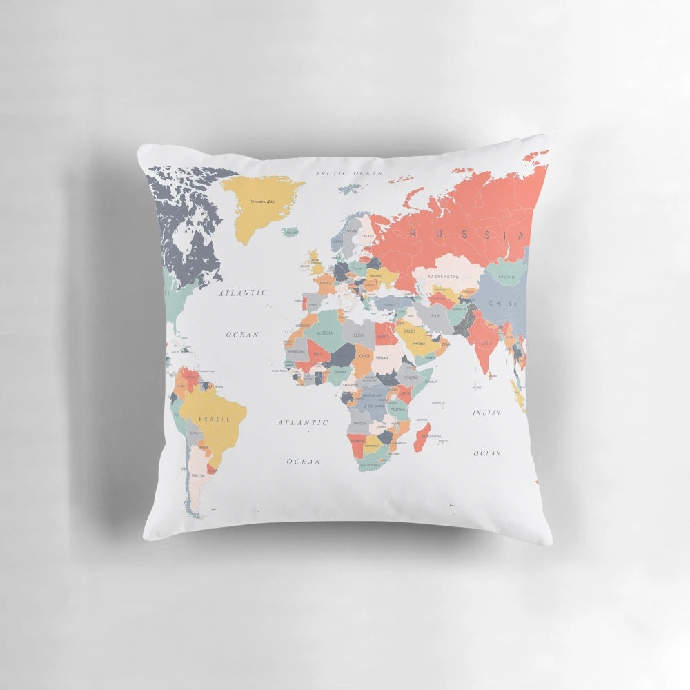Colorful world map printed on a soft and plush pillow