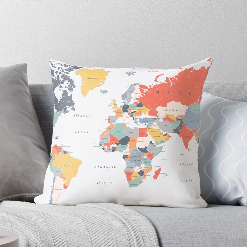Colorful world map printed on a soft and plush pillow
