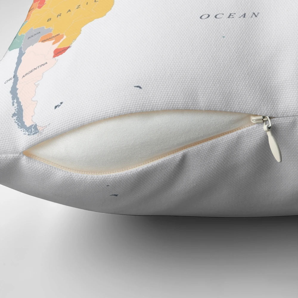 Colorful world map printed on a soft and plush pillow