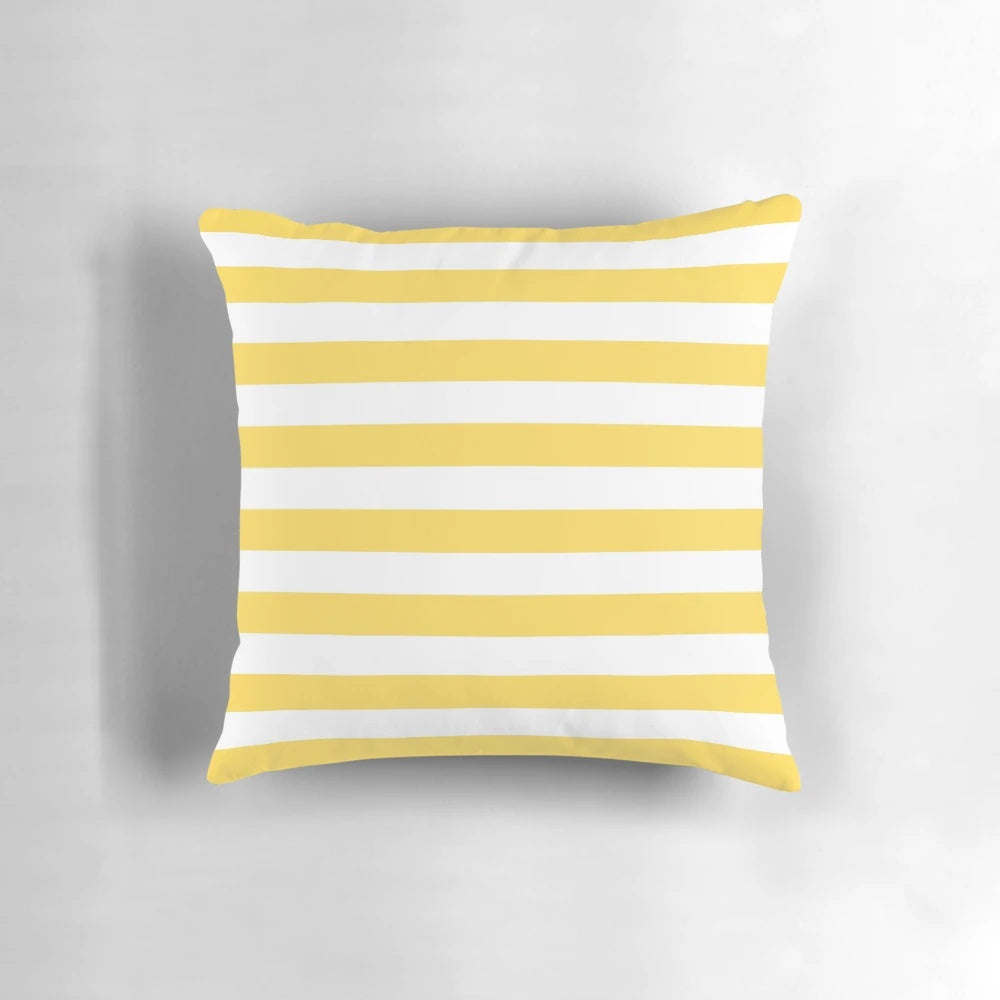 A cozy and stylish yellow and white horizontal striped decorative pillow.