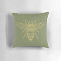 A vibrant yellow pillow with a repeating bee pattern, perfect for adding a touch of nature-inspired charm to your home.