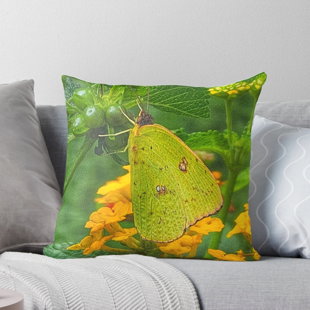 Soft and cozy yellow pillow with a beautiful butterfly print design, perfect for adding a touch of nature to your bedroom decor.