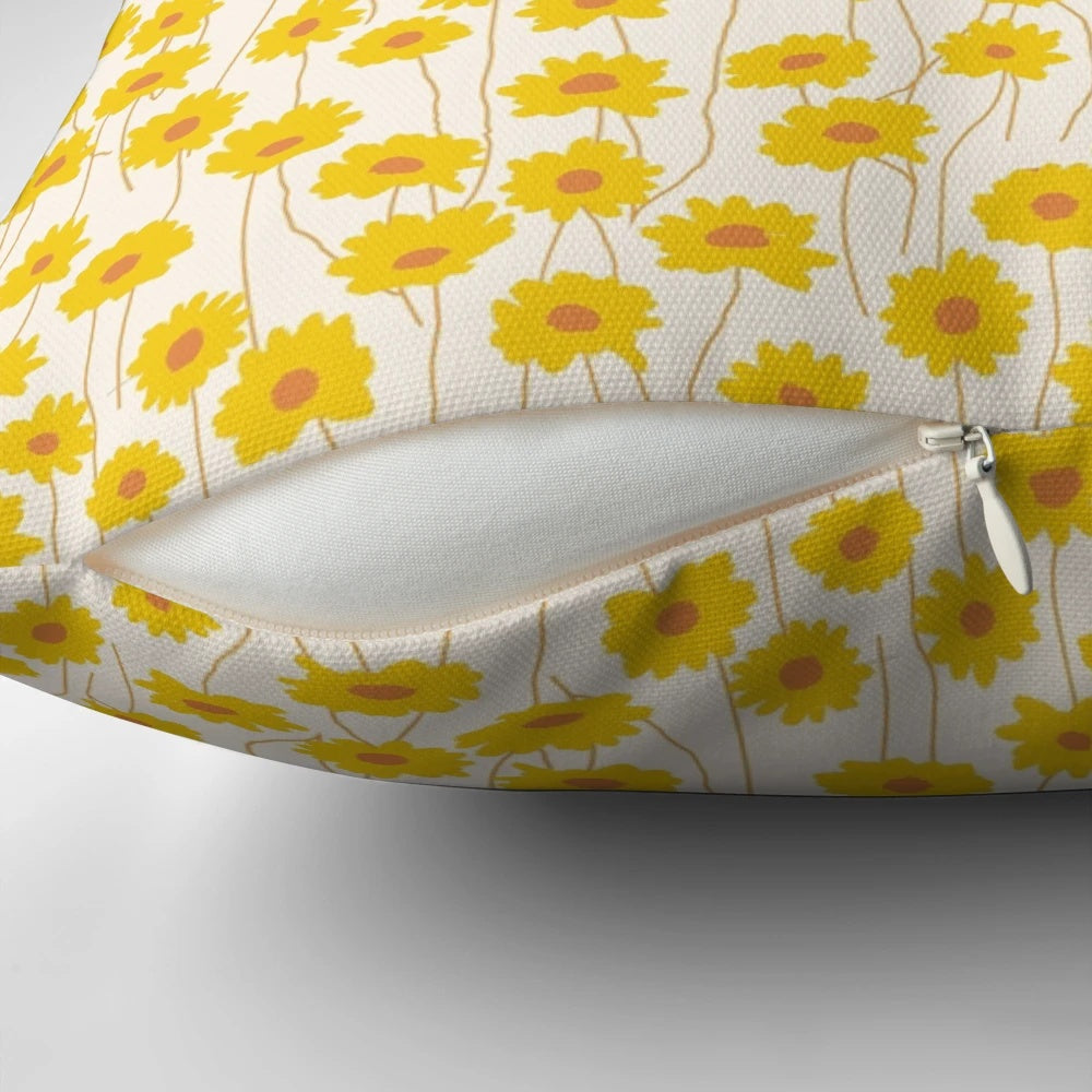 Beautiful yellow flowers in a floral pattern decorative throw pillow for living room, bedroom, or outdoor patio decor.