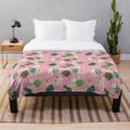 Yellow labrador retriever dog breed on a tropical pink plush blanket