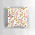 Colorful throw pillow featuring a whimsical yellow llama and red cacti design