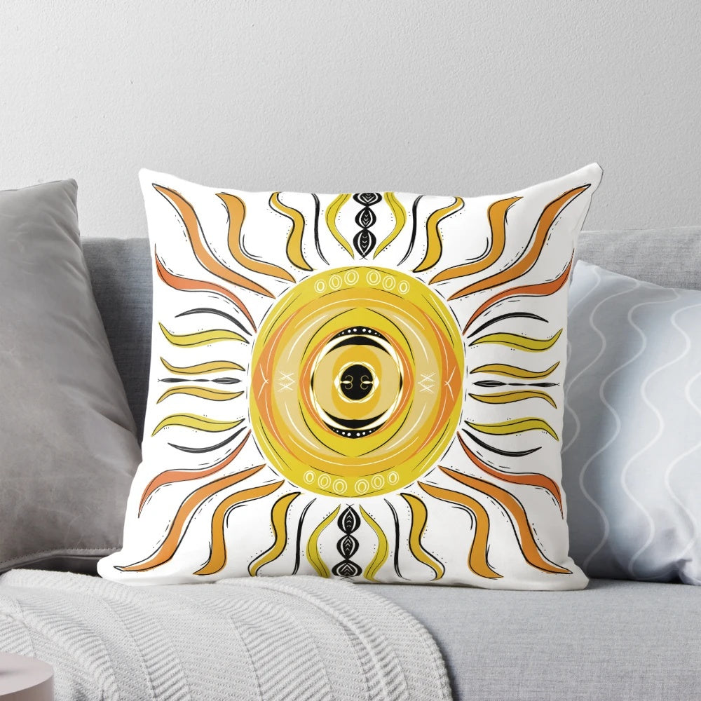 Vibrant yellow mandala print throw pillow with bold sun design