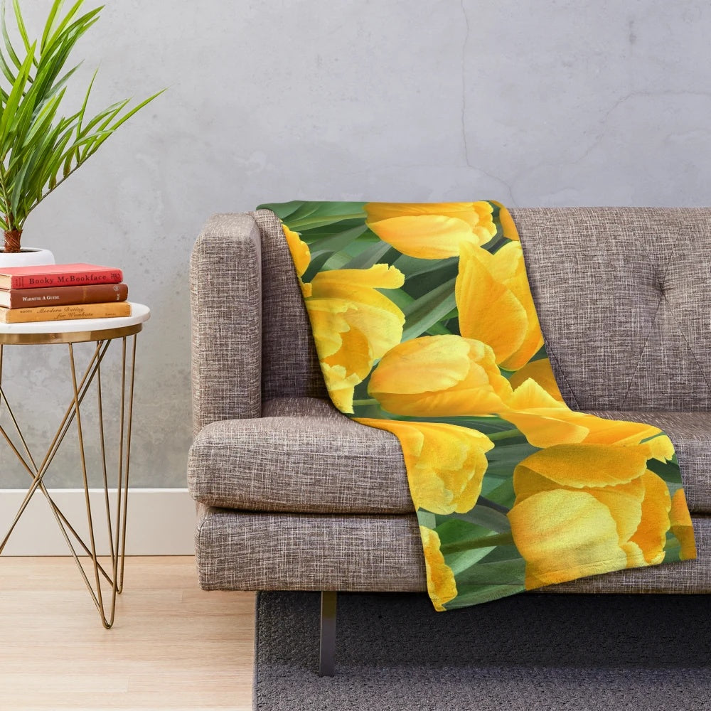 Yellow tulips in a field plush blanket