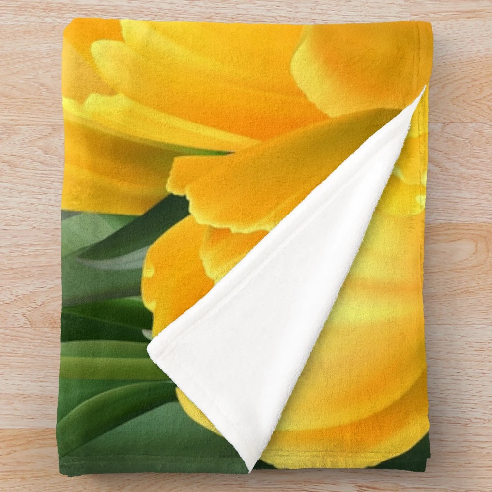 Yellow tulips in a field plush blanket