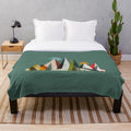 Colorful plush blanket featuring abstract shapes and landscapes inspired by the indie rock band Young the Giant.
