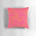 Close-up of a pink and orange zebra-striped decorative pillow