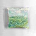 Vincent van Gogh's iconic green wheat fields painting from Auvers, France in 1890 featured on a plush pillow