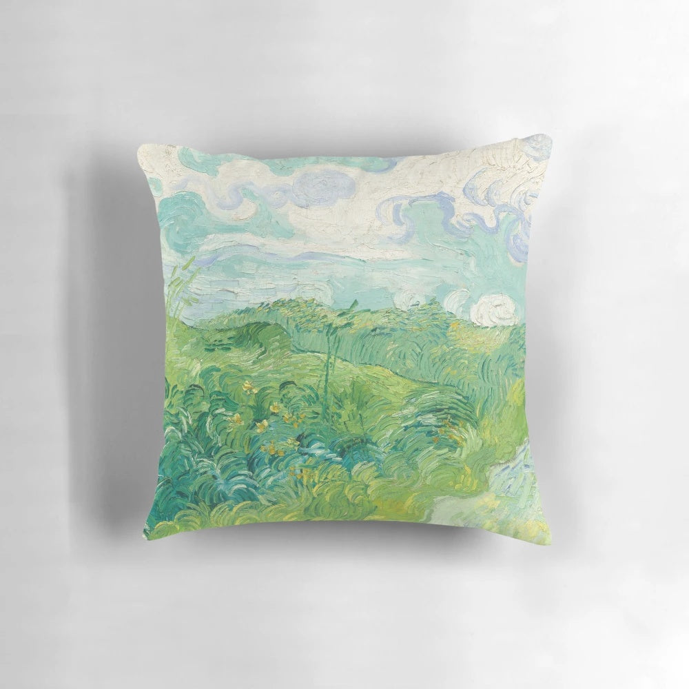 Vincent van Gogh's iconic green wheat fields painting from Auvers, France in 1890 featured on a plush pillow