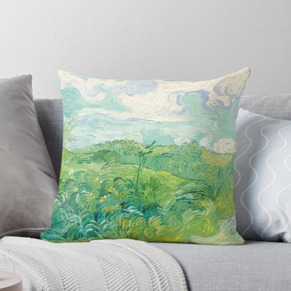 Vincent van Gogh's iconic green wheat fields painting from Auvers, France in 1890 featured on a plush pillow